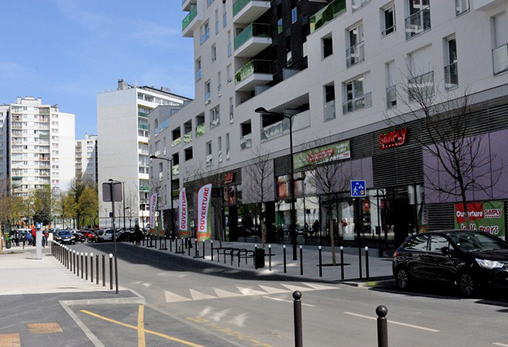 Mixité fonctionnelle à l’échelle d'un immeuble de logements avec rez-de-chaussée commercial